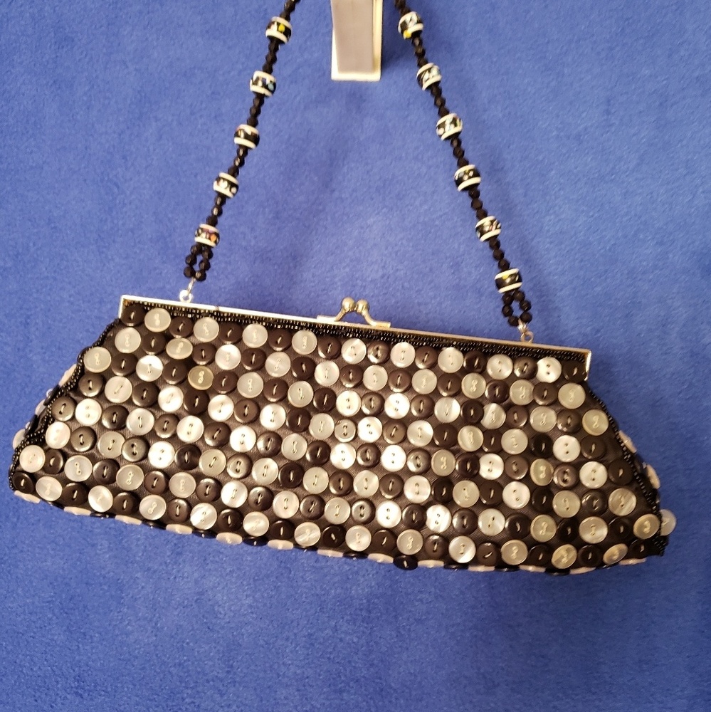 Funky little black purse with buttons🤪